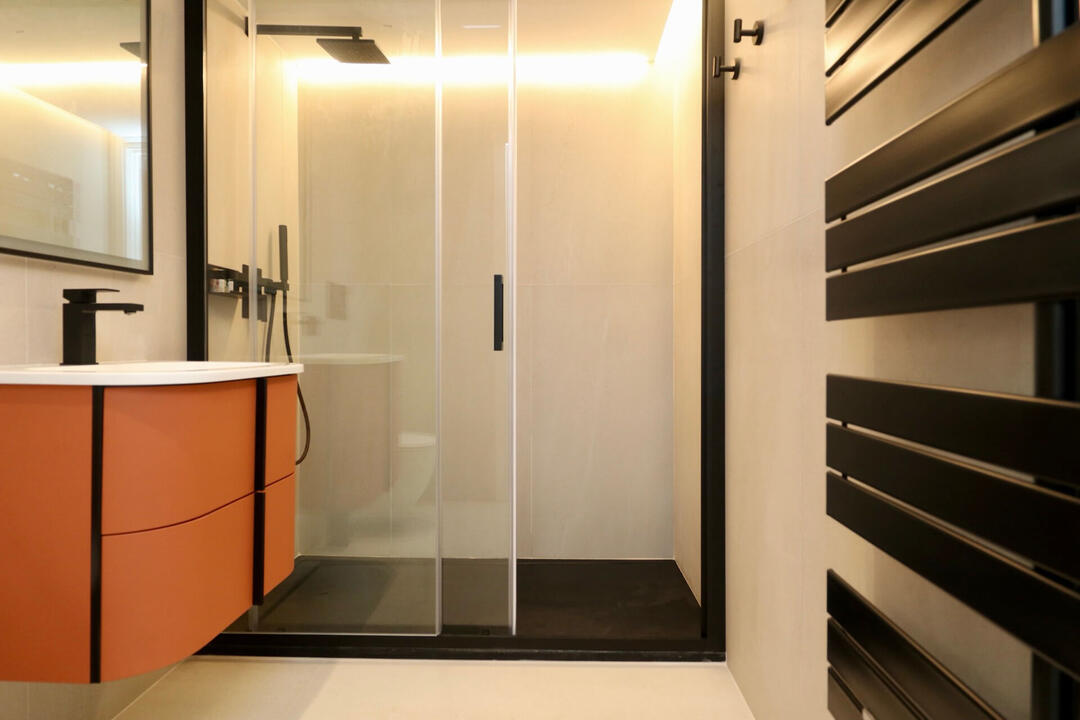 Comfortable bathroom with walk-in rain shower Comfortable bathroom with walk-in rain shower